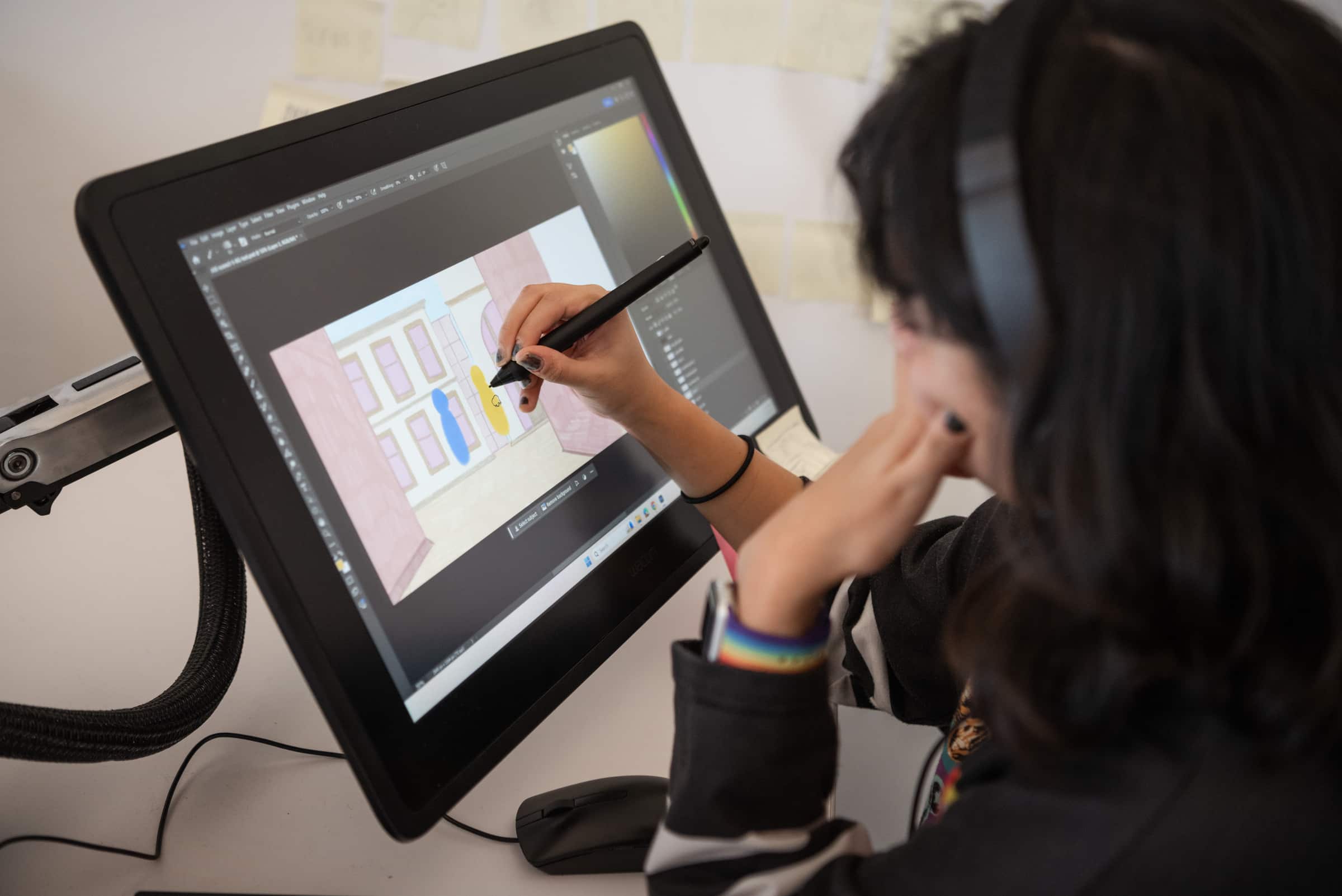 Student animating on a Cintiq drawing tablet in the Animation Studio.