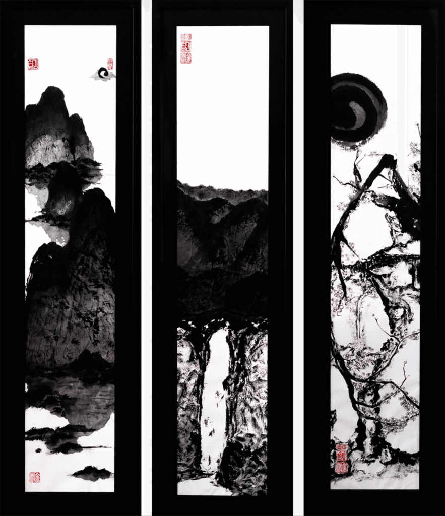 Triptych of black ink landscape paintings framed vertically.