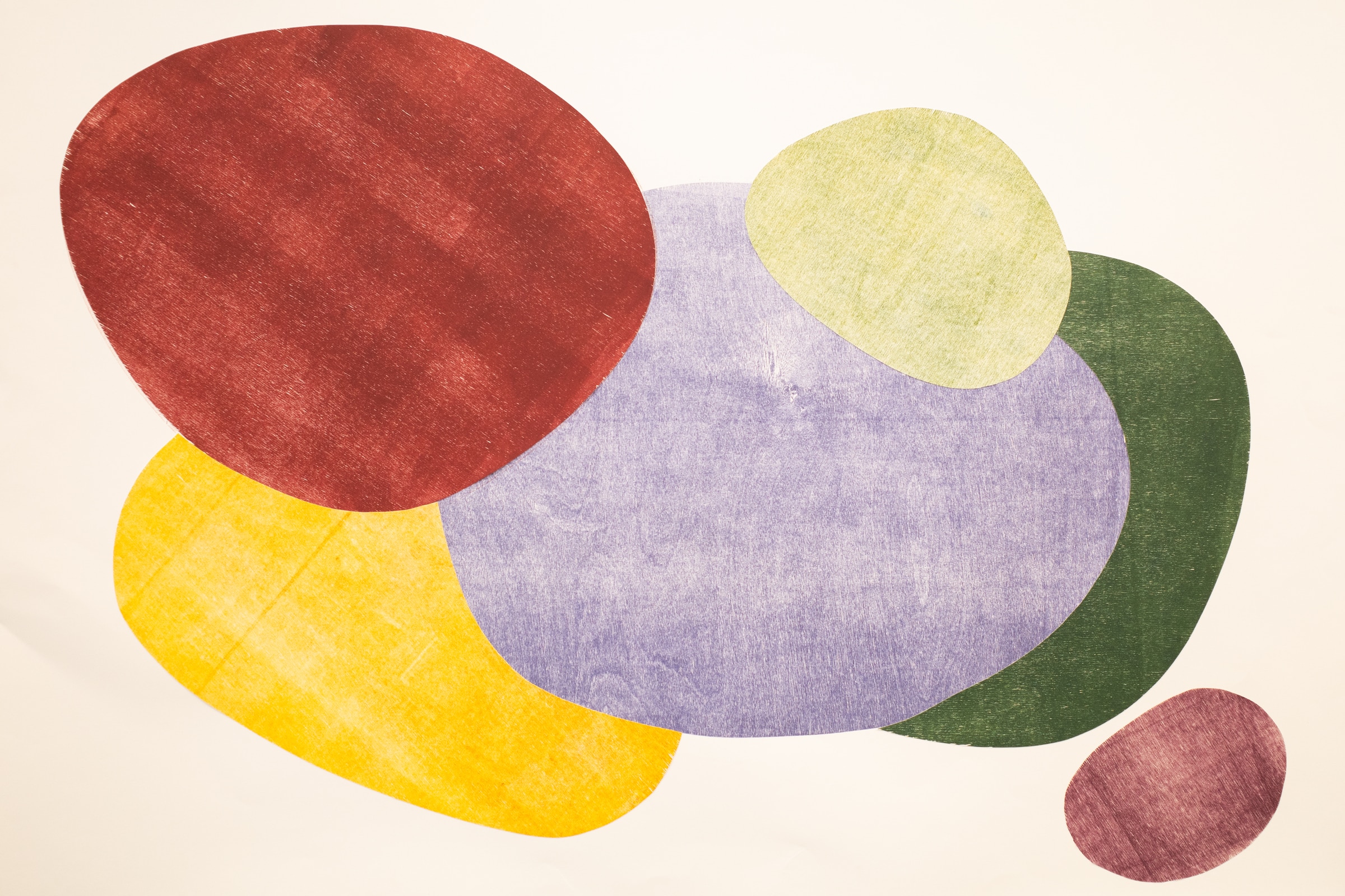 Artwork features a composition of layered circular shapes in warm, earthy tones of red and orange, set against a soft paper.