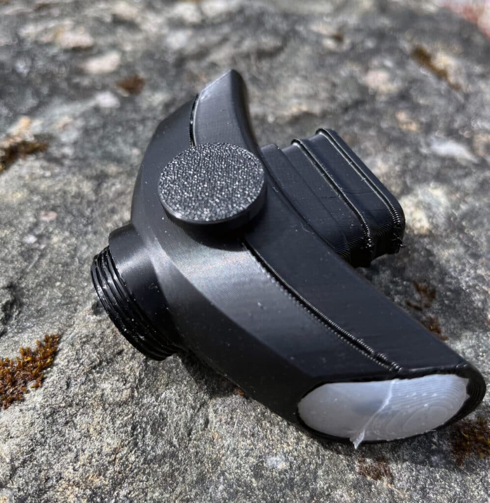 Prototype respirator attachment shown in close-up detail.