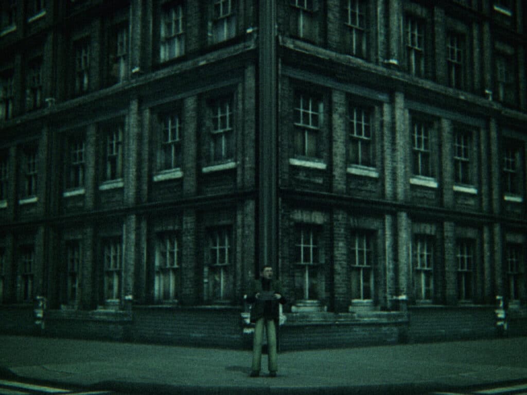 An animation still of a lone figure that stands at the corner of a tall brick building with identical windows on both sides.