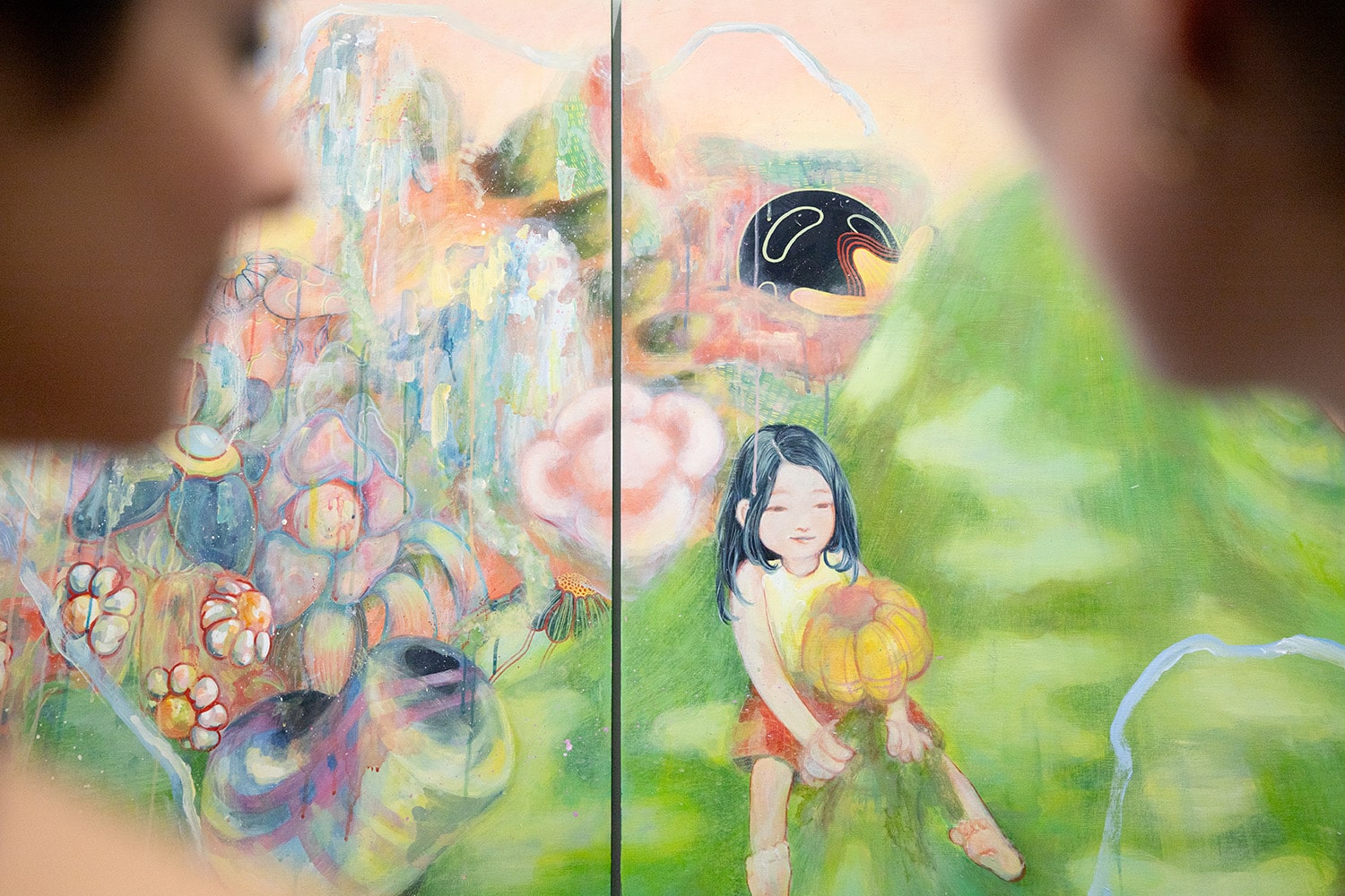 Attendees admire Rose Choi's (BDes 2025, Interaction Design) ':core memory 쉼터' (acrylic on wooden panel, 2025) at the opening reception for Show 2025 at Emily Carr University of Art + Design.