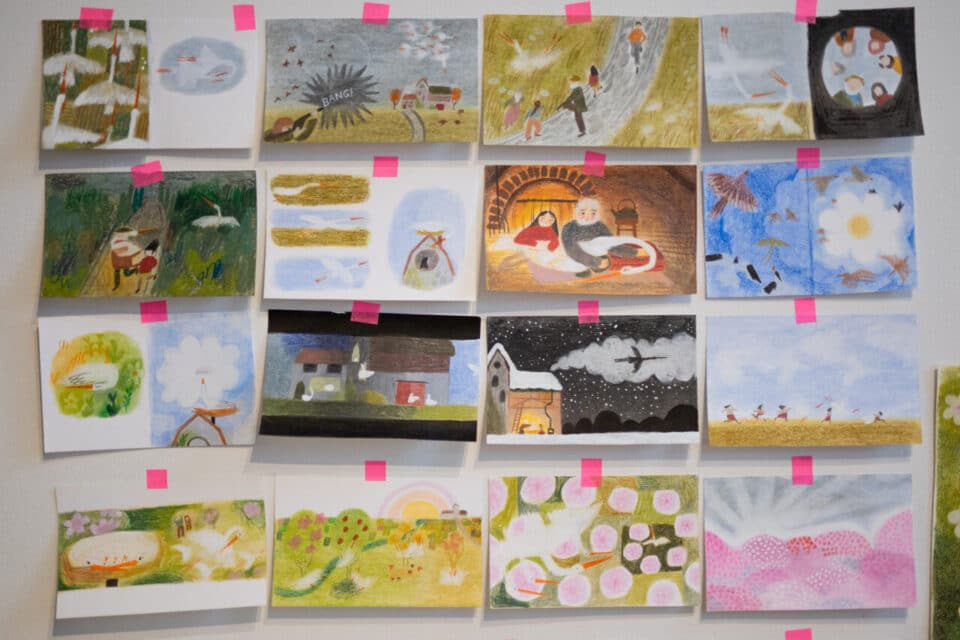 In these hand-drawn thumbnails from the wall of Chelsea’s studio, she works to establish the vernal colour palette and other visual themes for the book Springtime Storks. Photo by Perrin Grauer.