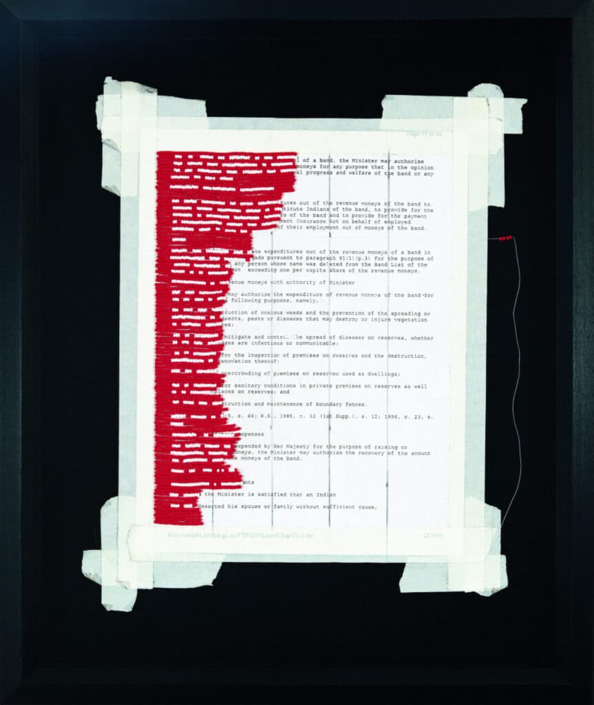 Printed document mounted on a dark background, partially covered with dense red stitched beading.