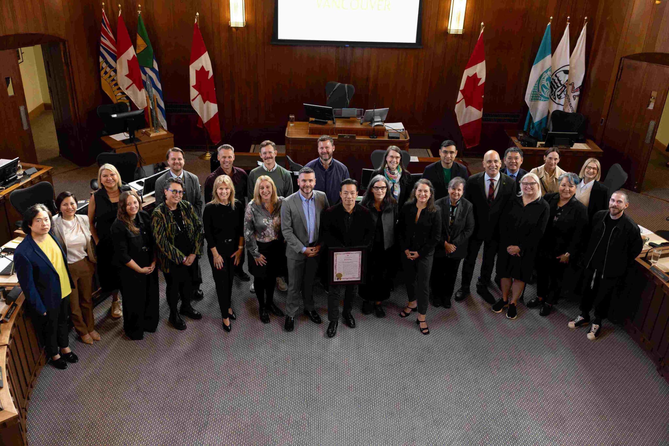 ECU staff, faculty and leadership with the City of Vancouver's Mayor and Council in the council chambers during a proclamation ceremony in honour of the university's centennial.