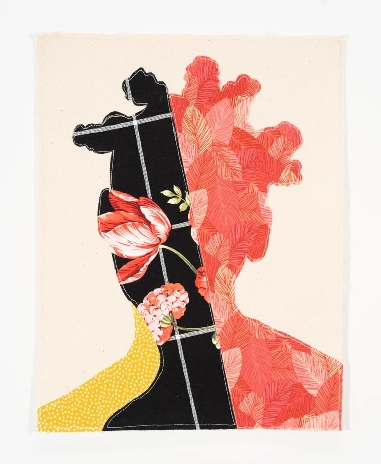 A textile artwork depicts two overlapping profile silhouettes composed of patterned fabrics in black, red and yellow, accented with floral imagery and stitched details against a neutral background.