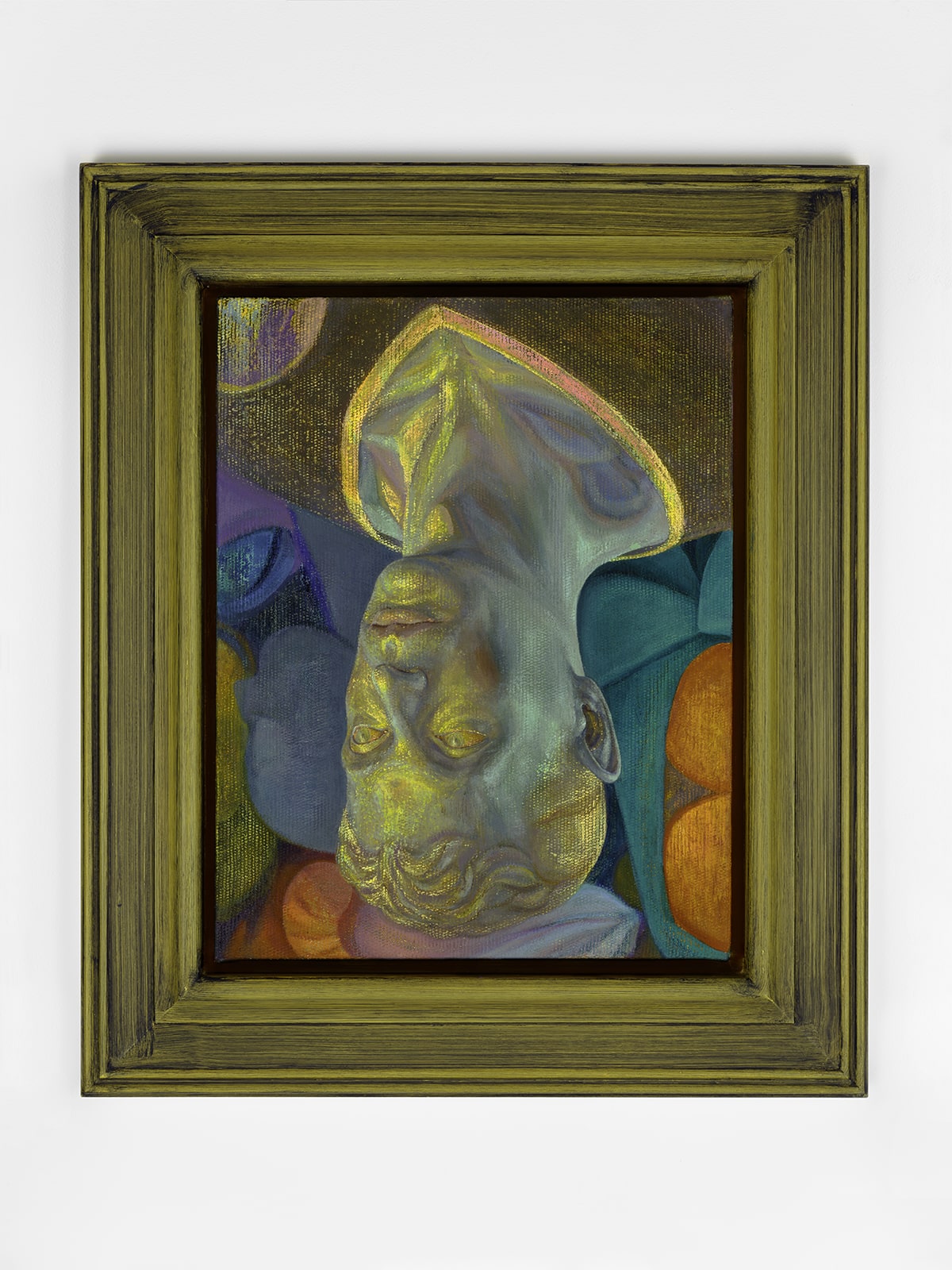 A framed painting of an upside-down face rendered in shimmering greens, yellows and blues, surrounded by abstract shapes in purple, teal and orange.
